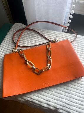 All Saints Women's Orange Leather Shoulder Bag with Gold Chain Accent